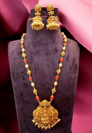 Beautiful traditional coral set with God laxmi motive locket with coral pumpkins beads